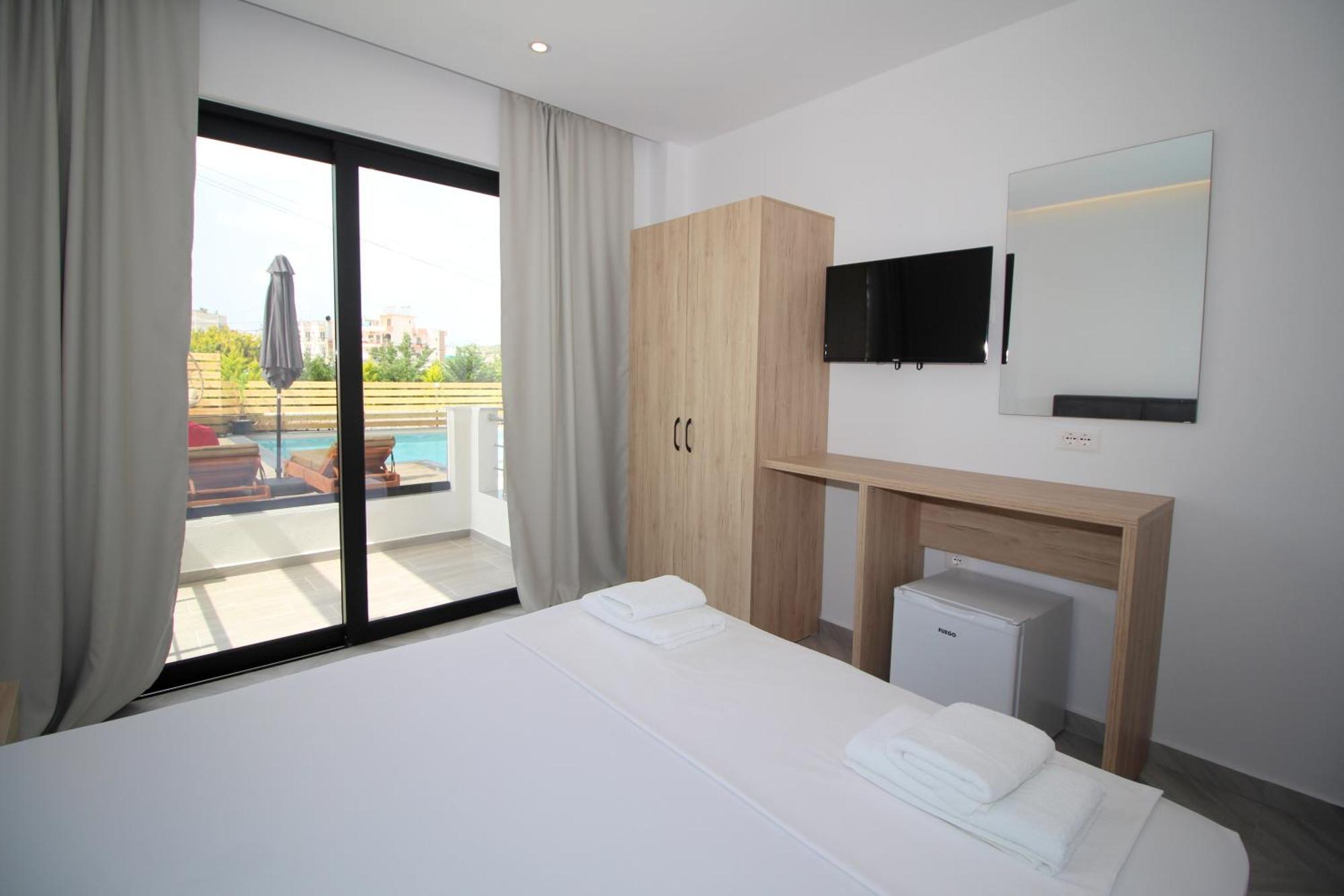 Noa Boutique Hotel Ксамил Стая снимка