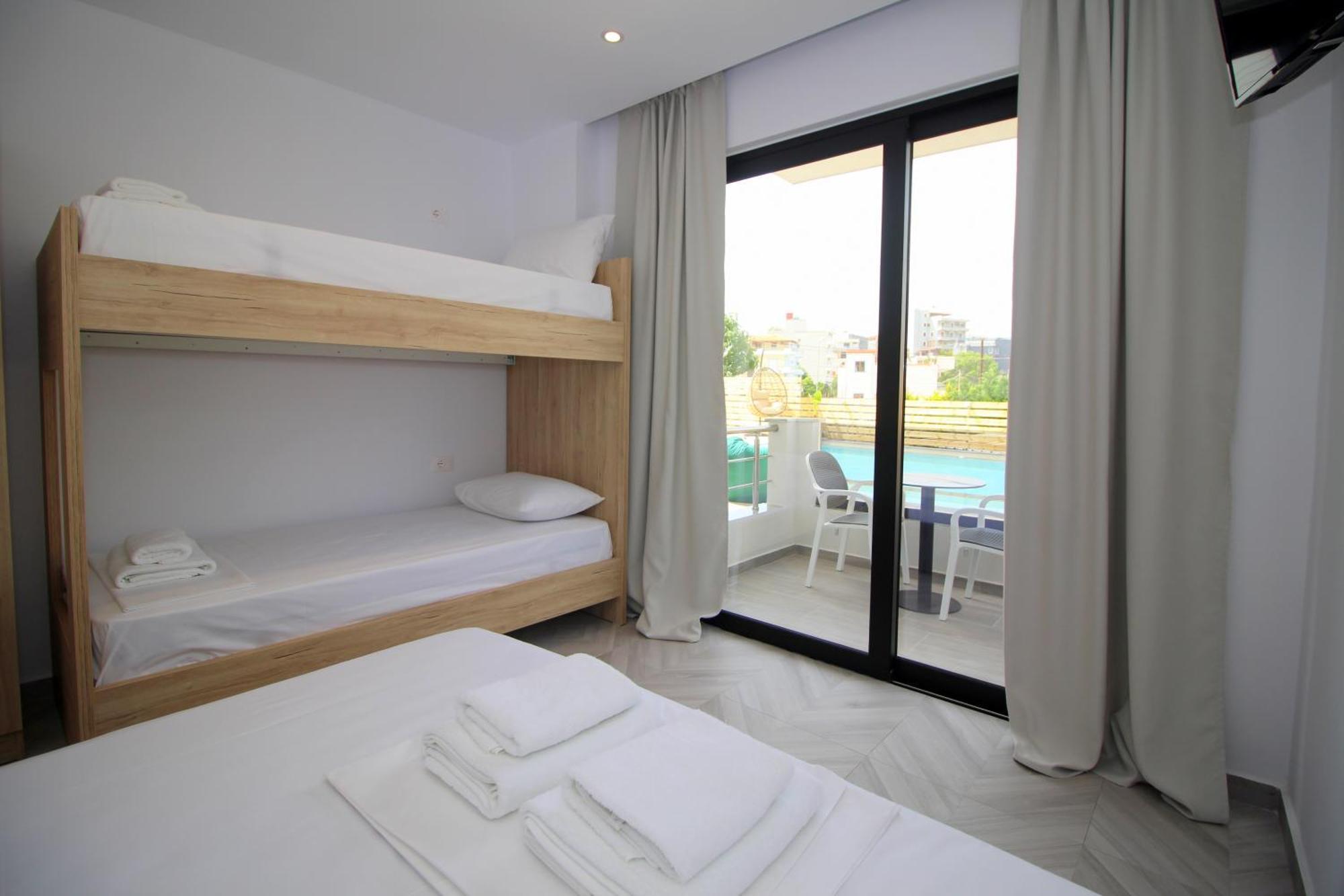 Noa Boutique Hotel Ксамил Стая снимка