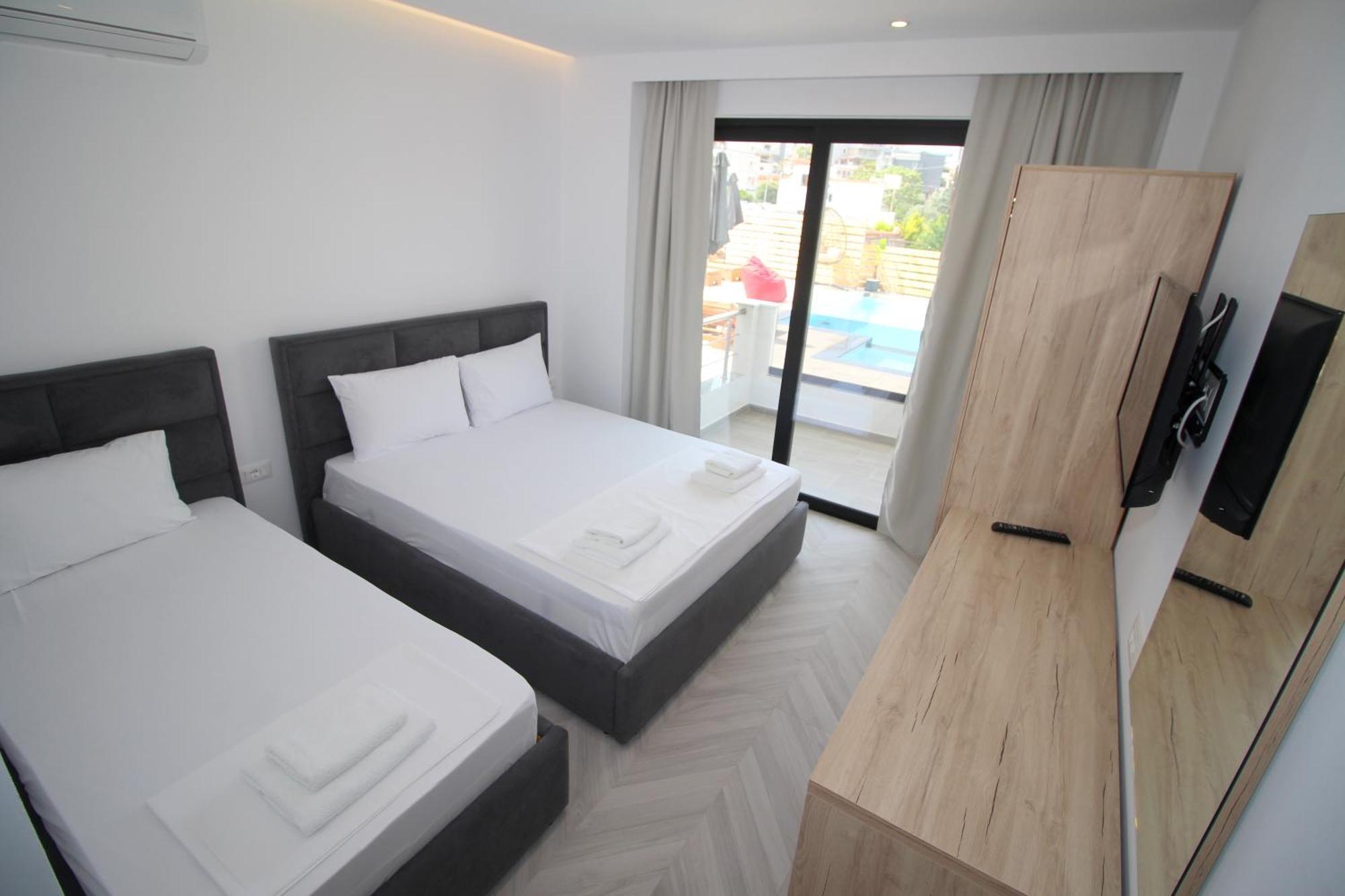 Noa Boutique Hotel Ксамил Стая снимка