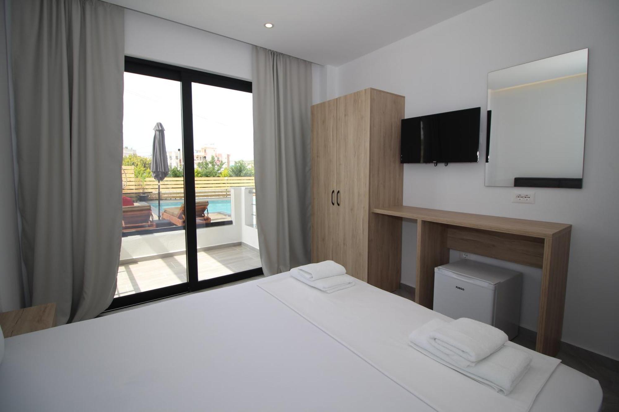 Noa Boutique Hotel Ксамил Стая снимка